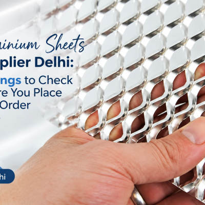 Hand holding an expanded aluminium sheet, featured image for aluminium sheets supplier Delhi buyer's checklist